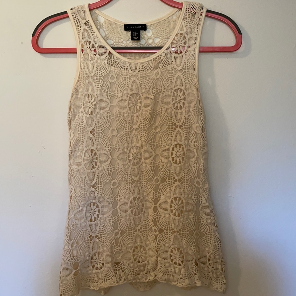 Crochet sleeveless blouse with underlay camisole.